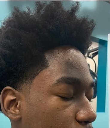 Fresh fade with a curly top